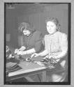 [Two Women Marking Fabric]