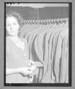 [Woman with Finished Garments]