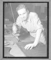 [Man Using Cutting Machine]
