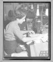 [Woman Sewing]
