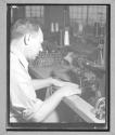 [Man Sewing]