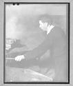 [Man with Cloth]