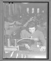 [Woman Sewing]