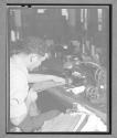 [Man Sewing]