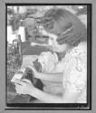 [Woman Sewing]