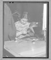 [Woman Hand-Sewing]