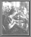 [Woman Sewing]