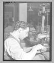 [Younger Man Sewing]