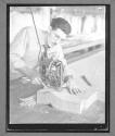 [Man Cutting Cloth]