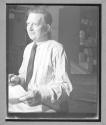 [Man with Paperwork]