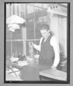 [Man Spraying Cloth]
