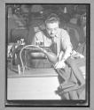 [Man Sewing]