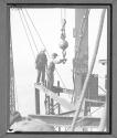 [Working on the Mooring Mast]