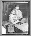 [Mother, Small Girl in Tenement]