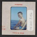 [Nicholas Christopher Muray on a boat (travel slide)]