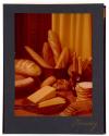[Table spread of cheese and bread (Kraft)]