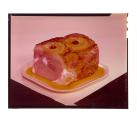 [Glazed ham with pineapple slices]