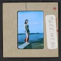 [Mimi Muray on a beach (travel slide)]