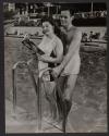 [Lenore Aubert and Unidentified Man]
