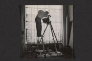 [Nickolas Muray with camera]