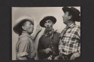 [Nickolas Muray with two men]