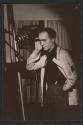 [Nickolas Muray with camera]