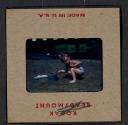 [Mimi Muray on a beach (travel slide)]