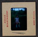 [Mimi Muray on a swing (travel slide)]