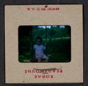 [Mimi Muray on a swing (travel slide)]
