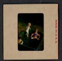 [Mimi and Nicholas Christopher Muray playing in a pool (travel slide)]