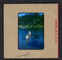 [Woman and Mimi Muray swimming (travel slide)]