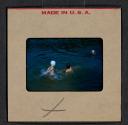[Mimi Muray and others swimming (travel slide)]