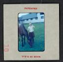 [Nicholas Christopher Muray with a horse (travel slide)]