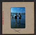 [Nickolas Muray and a woman on a beach (travel slide)]