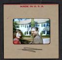 [Peggy Muray and Henry Dreyfuss standing outdoors (travel slide)]