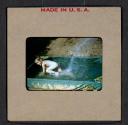 [Mimi Muray playing in a pool (travel slide)]