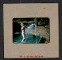 [Mimi Muray playing in a pool (travel slide)]