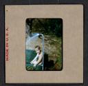 [Mimi Muray playing in a pool (travel slide)]