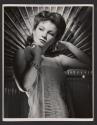 [Anne Baxter]