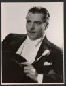 [Warner Baxter]
