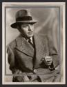 [Warner Baxter]