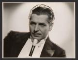 [Warner Baxter]