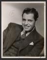 [Warner Baxter]