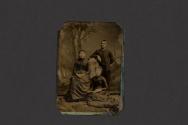 [Two women and one man posing in studio]