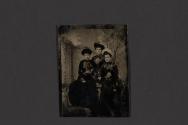 [Three women posing in studio]