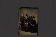 [Two men and two women posing in studio]
