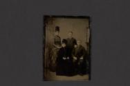 [Two men and two women posing in studio]