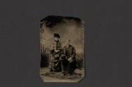 [Man and woman posing in studio]