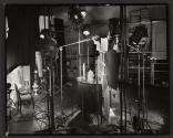 [View of interior of Nickolas Muray's studio with props and equipment setup]