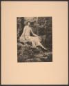 [Seated woman in hat]
